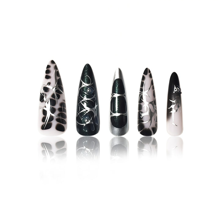 Elegant Stiletto Nail Art Extensions with Intricate Design Stornfield