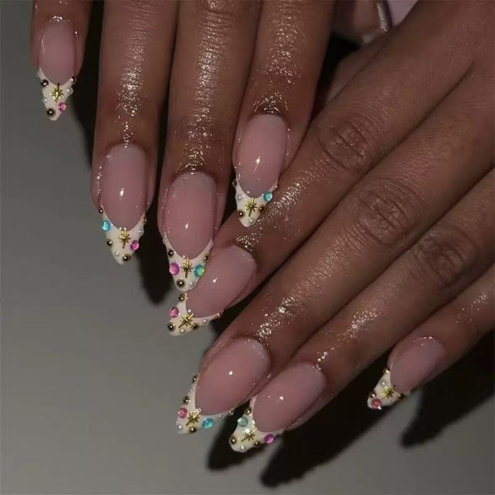 Artificial nail set with glamorous 3D decorations and sparkling rhinestones Stornfield