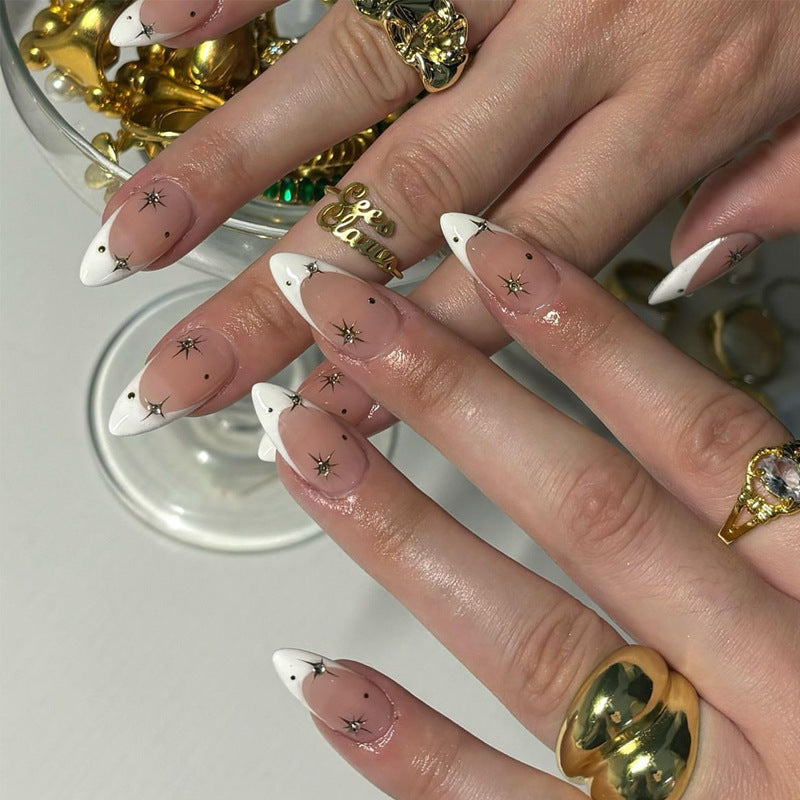 Artistic Stiletto Press-On Nail Art with Star and Ombre Design Stornfield