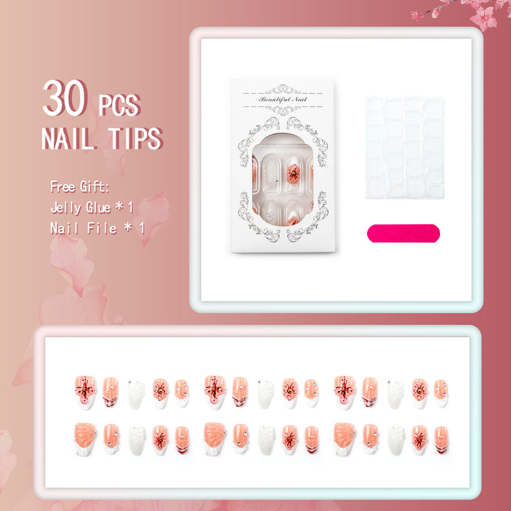 Artificial nails with handcrafted flower and glitter elements Stornfield