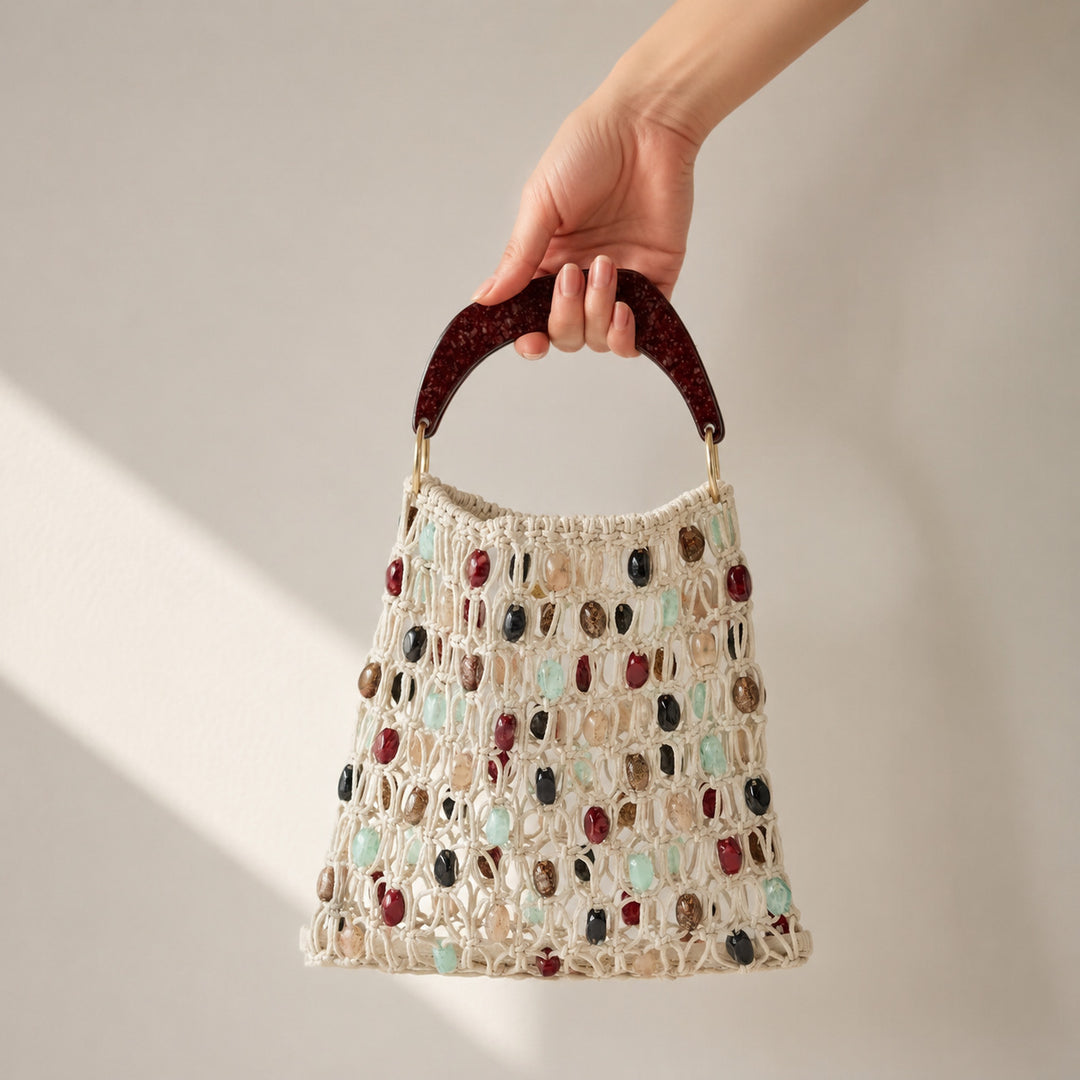 Handcrafted designer shoulder bag with unique stone accents Stornfield