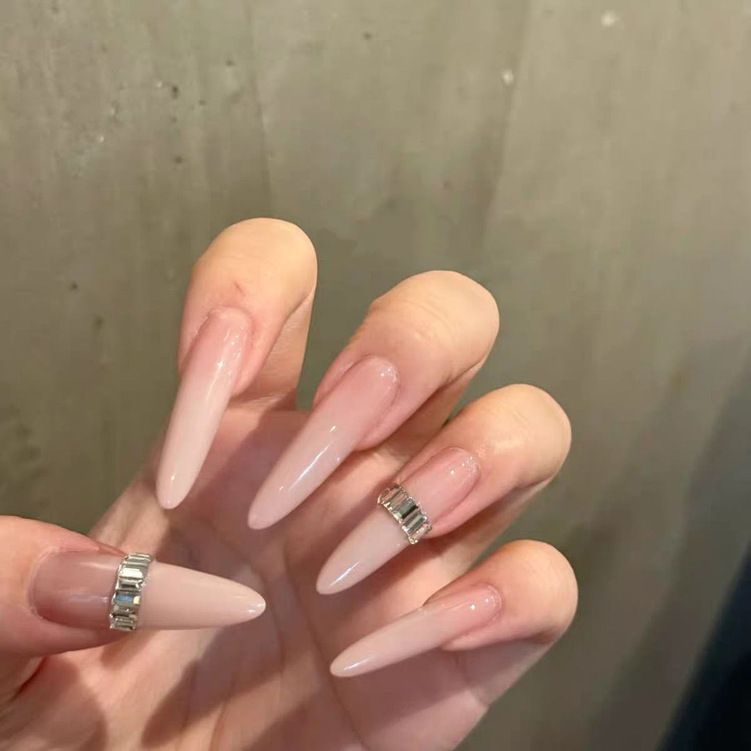 Elegant Stiletto Nail Extensions with Crystal Accents
