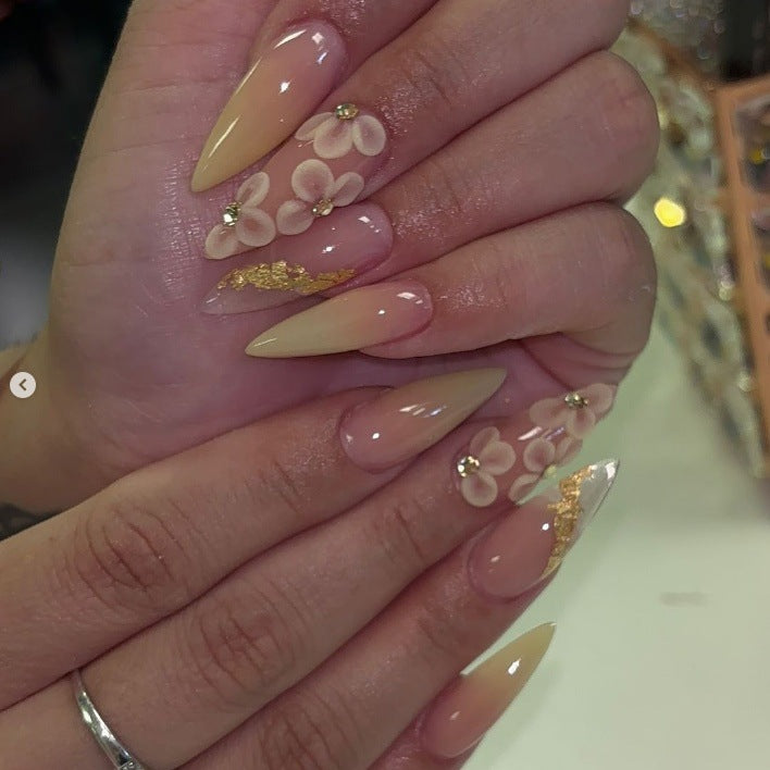 Artificial nail set with filigree flower decorations and elegant shine Stornfield