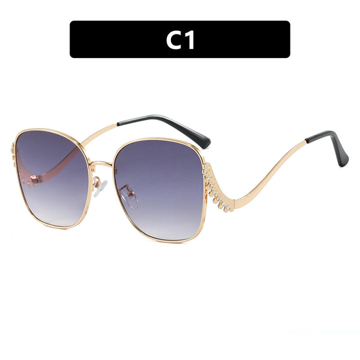 Women's striking sunglasses with sparkling appliqués Stornfield