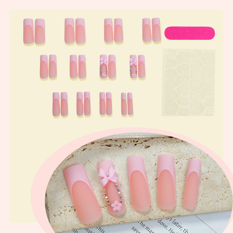 Decorative Press-On Nail Art with Floral and Bow Accents Stornfield