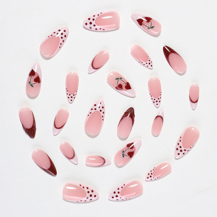 Creative nail art set with romantic heart design and playful accents Stornfield