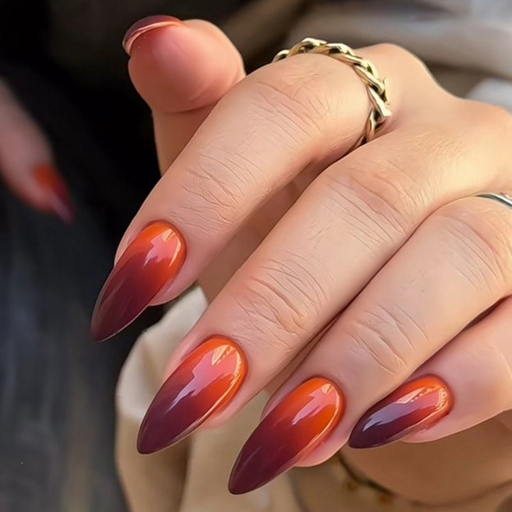 Acrylic nail set with luxurious color gradient and elegant lace accent Stornfield