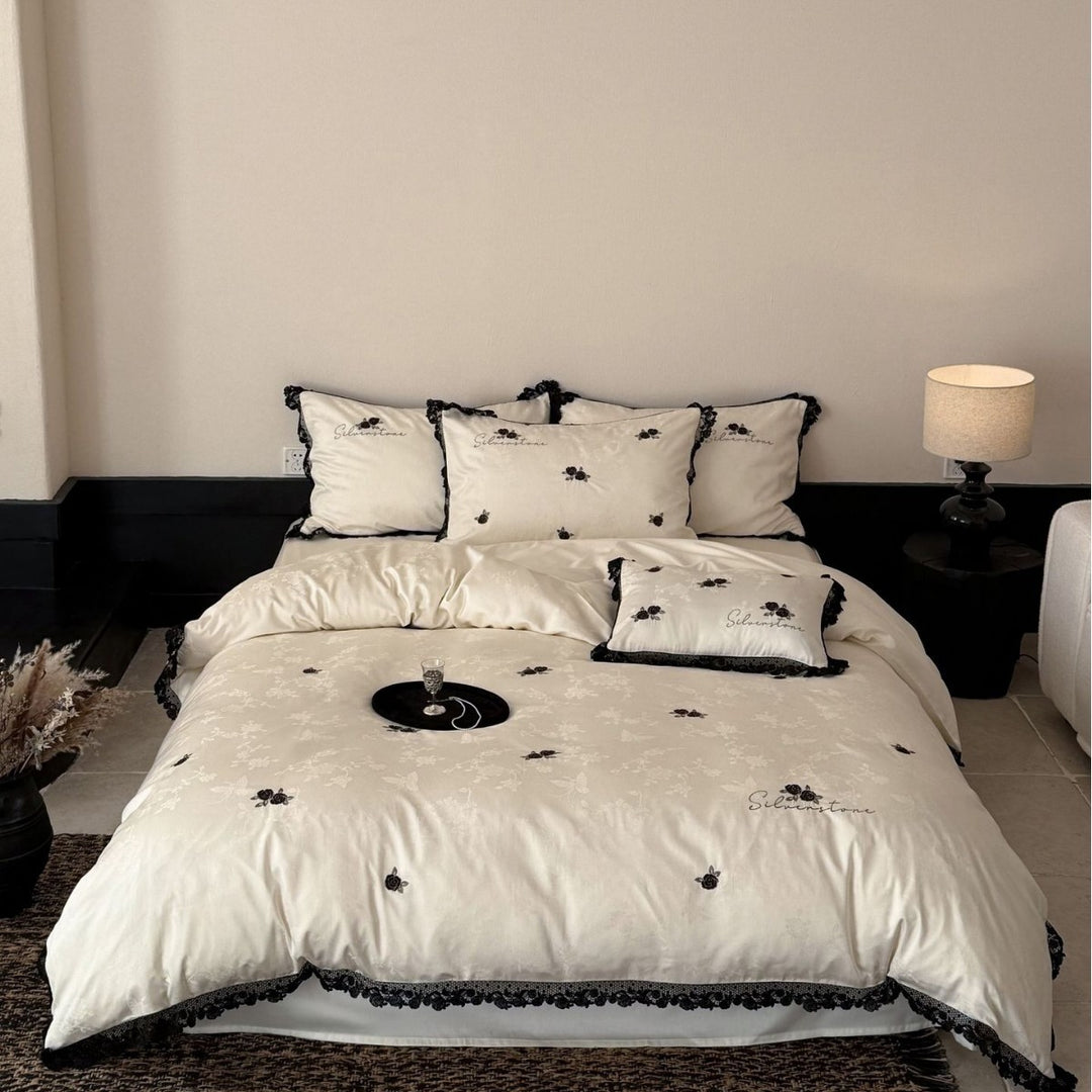 Luxurious cotton satin bedding set with lace border and rose embroidery
