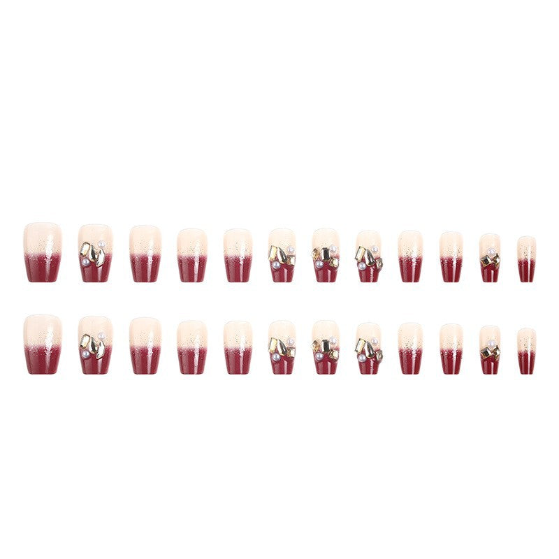 Acrylic nail set with elegant glitter and flower accents Stornfield