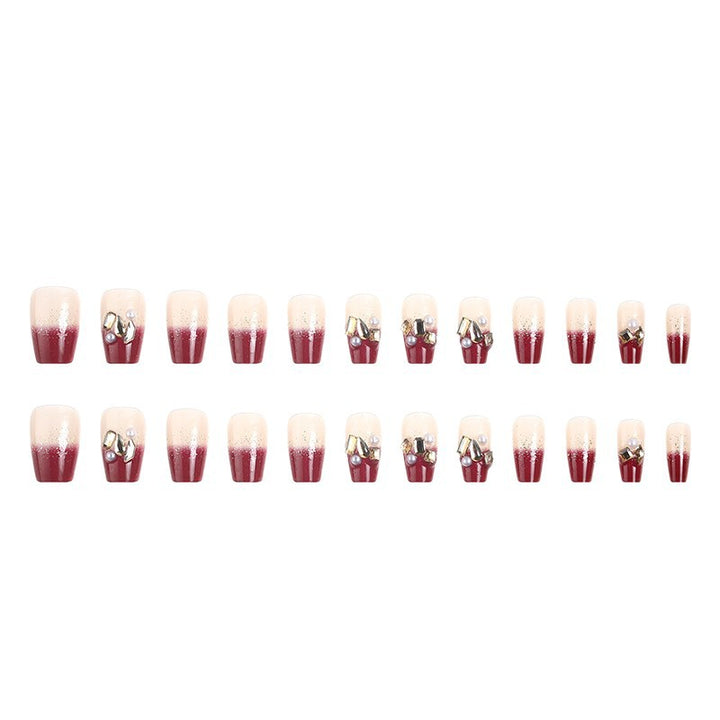 Acrylic nail set with elegant glitter and flower accents Stornfield