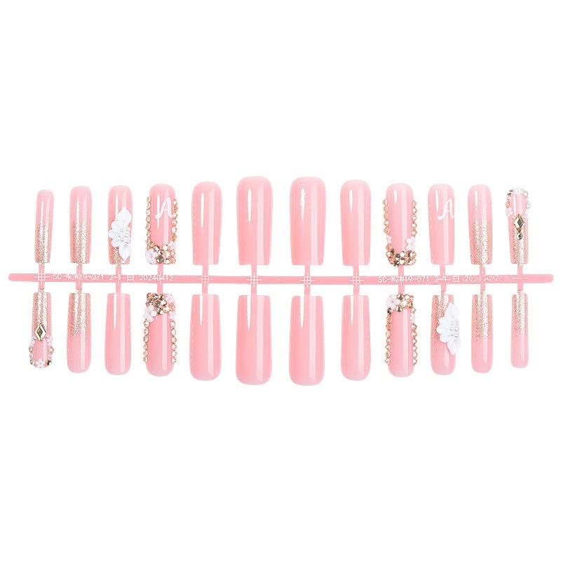 Creative acrylic nail set with delicate flower and gloss embellishments Stornfield