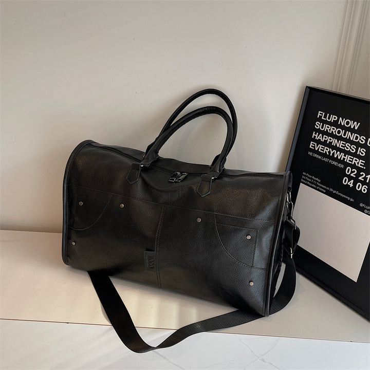 Elegant leather bag with stylish design and versatile carrying options Stornfield