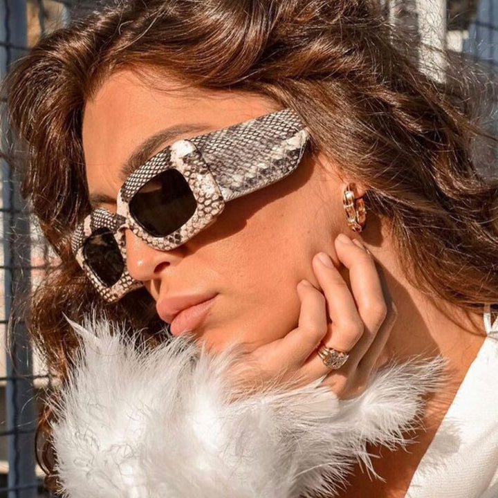 Women extravagant sunglasses with striking snake pattern Stornfield