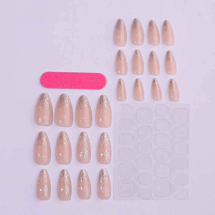 Nail art set with elegant glitter French design and artistic embellishments Stornfield