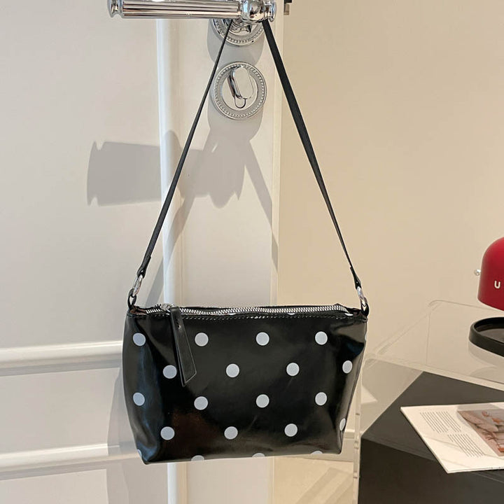 Sleek Polka Dot Handheld Clutch