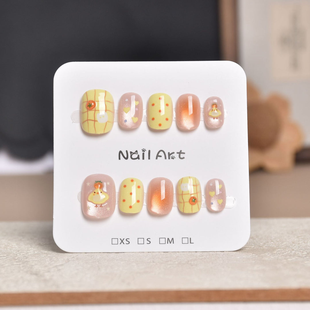 Decorative Press-On Nail Extensions with Floral Accents Stornfield