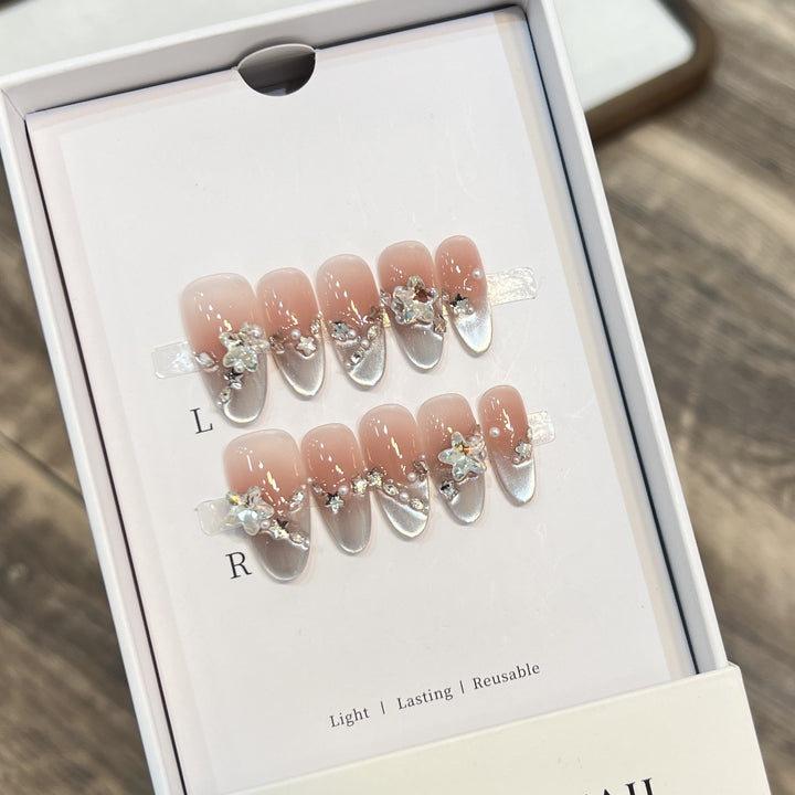 Elegant Press-On Almond Nails with Floral Accents Stornfield