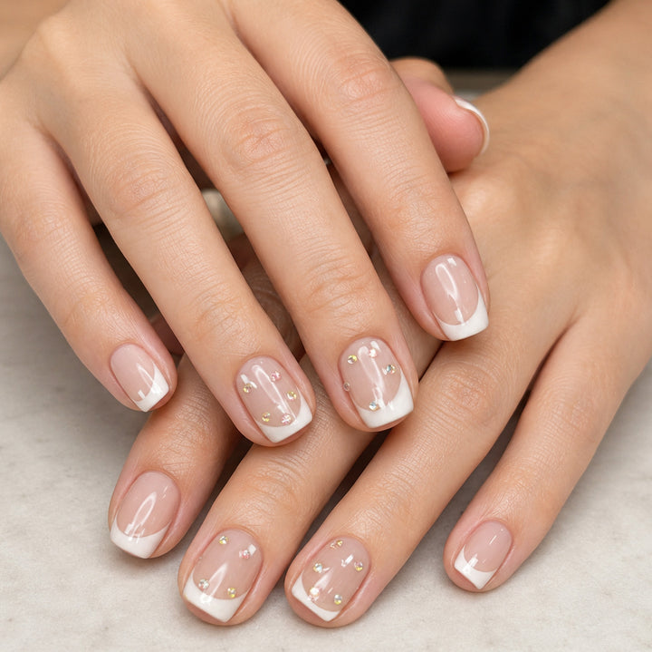 Elegant French Tip Nail Art Enhancements with Gem Accents Stornfield