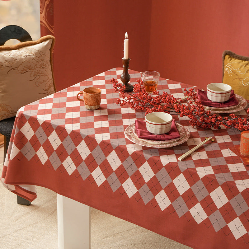 Printed rectangular tablecloth made of easy-care polyester with decorative hem border