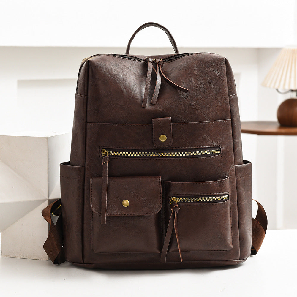 Stylish Multi-Pocket Faux Leather Backpack Stornfield