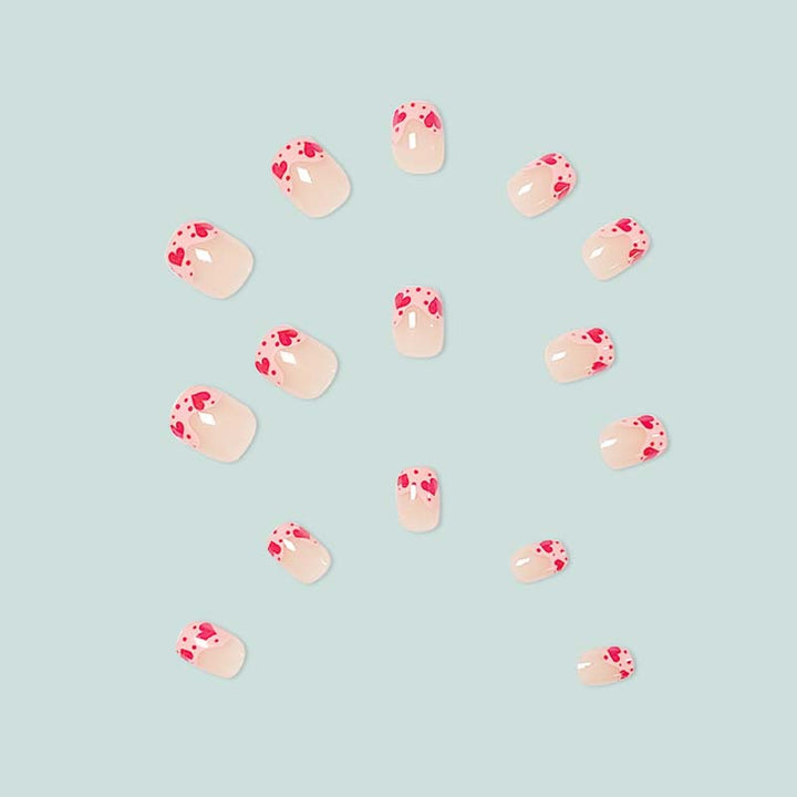 Artfully designed nail tips with heart motifs Stornfield