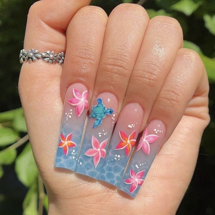 Artificial nail tips with tropical flower pattern and maritime turtle decoration Stornfield