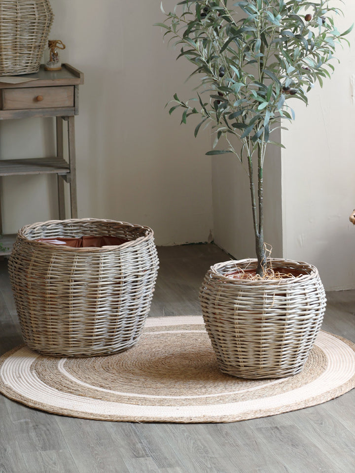 Stylish laundry basket made of braided natural material Stornfield