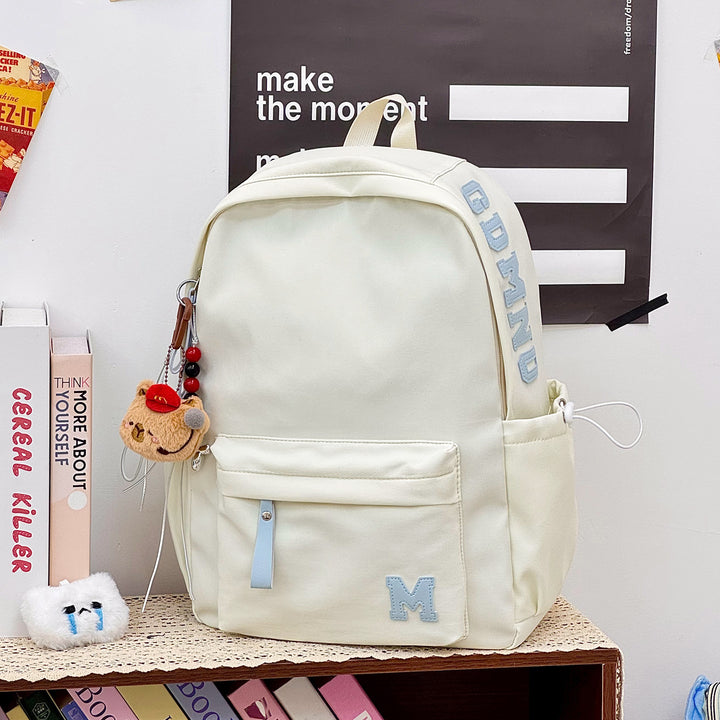Stylish Canvas Backpack with Plush Keychain Stornfield