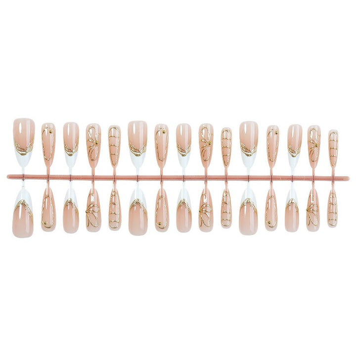Nail art set with filigree gold accents Stornfield