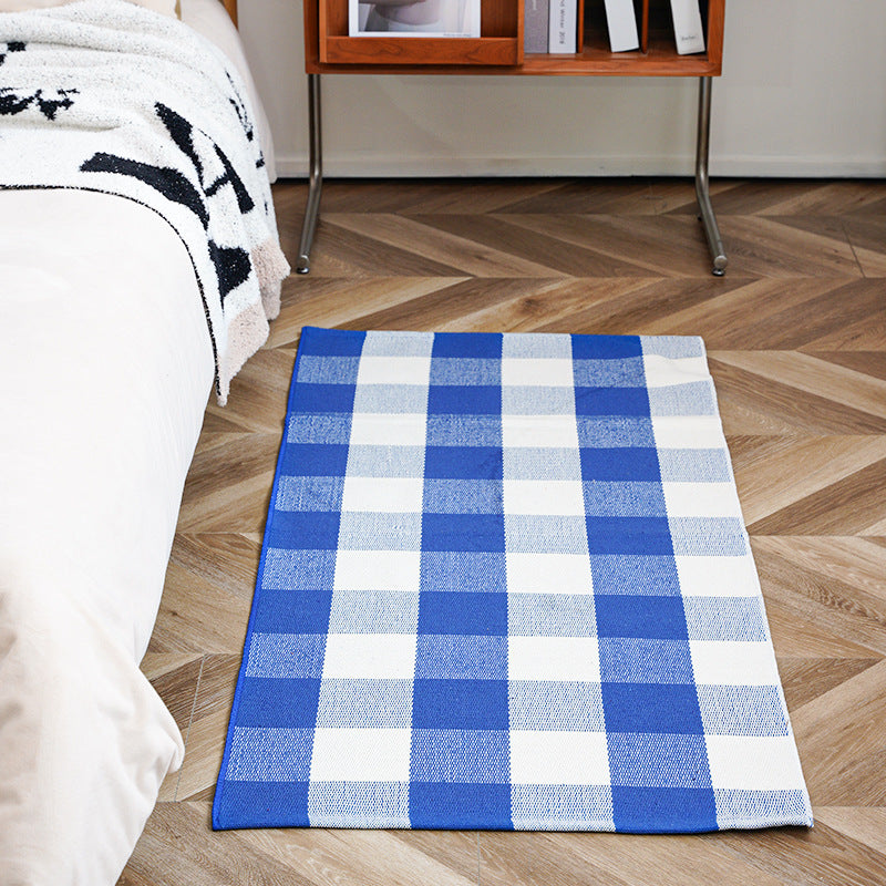 woven living room runner with fringes and geometric weave pattern
