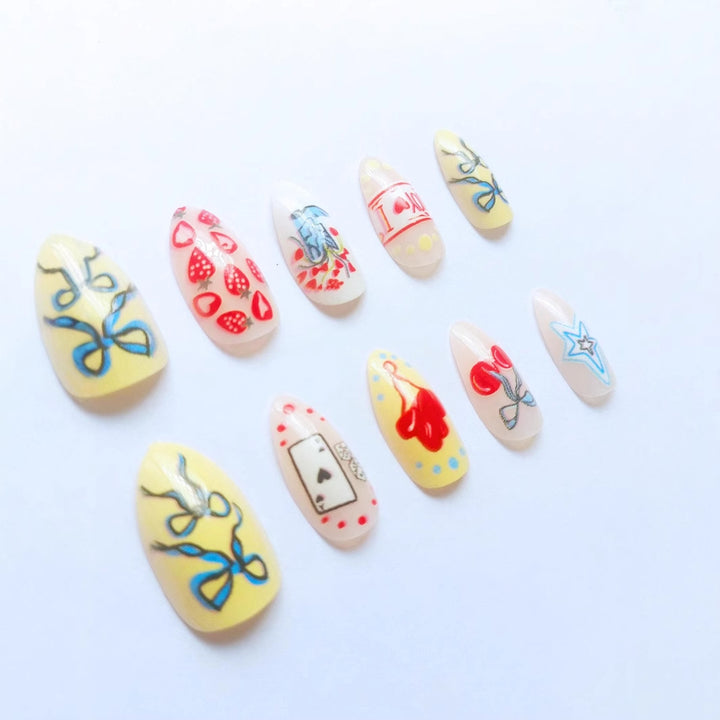 Art nail set with playful motifs and creative designs Stornfield