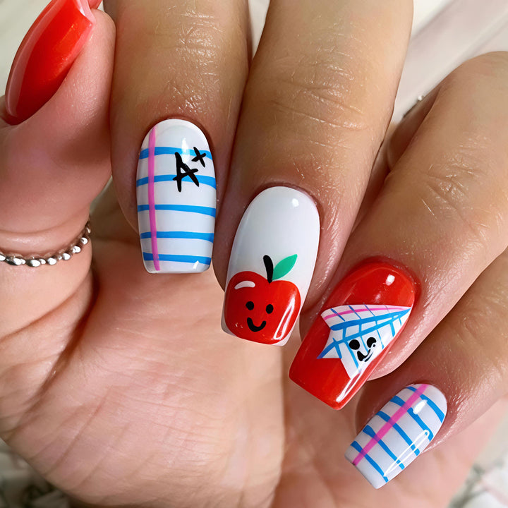 Creative art nails with cheerful school motif Stornfield