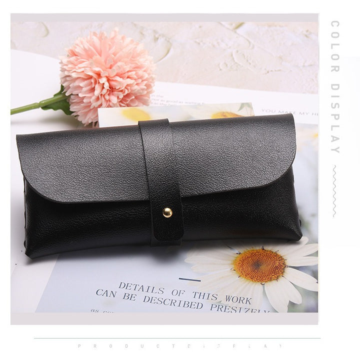 Unisex glasses case made of high-quality leather with button-crafted closure Stornfield