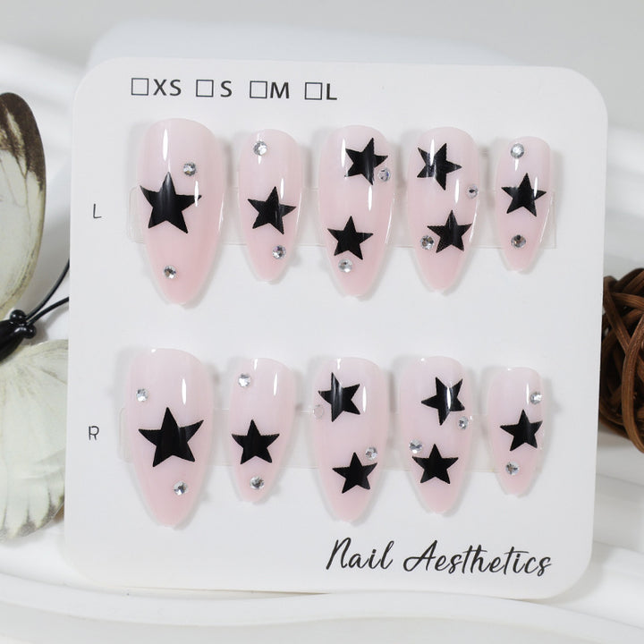 Nail art set with playful star designs Stornfield