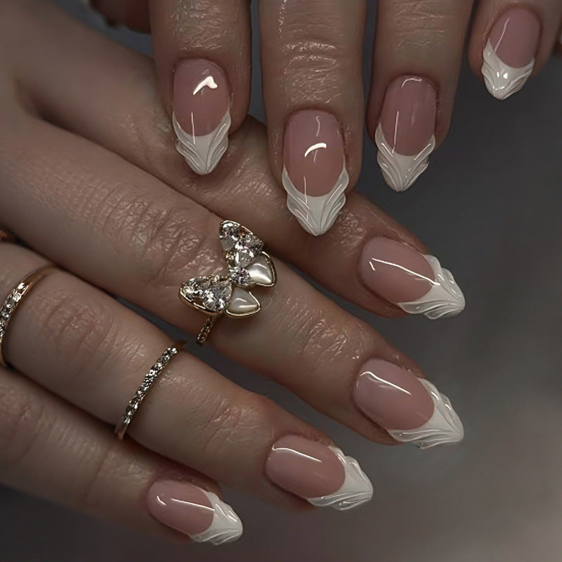 Artifical nail set with elegant tips and subtle embellishments Stornfield