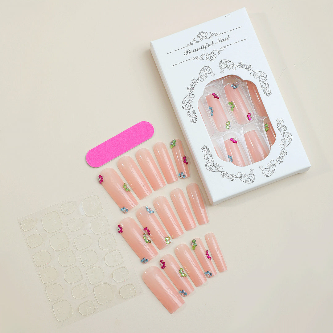 Artificial nail set with rhinestone accents Stornfield