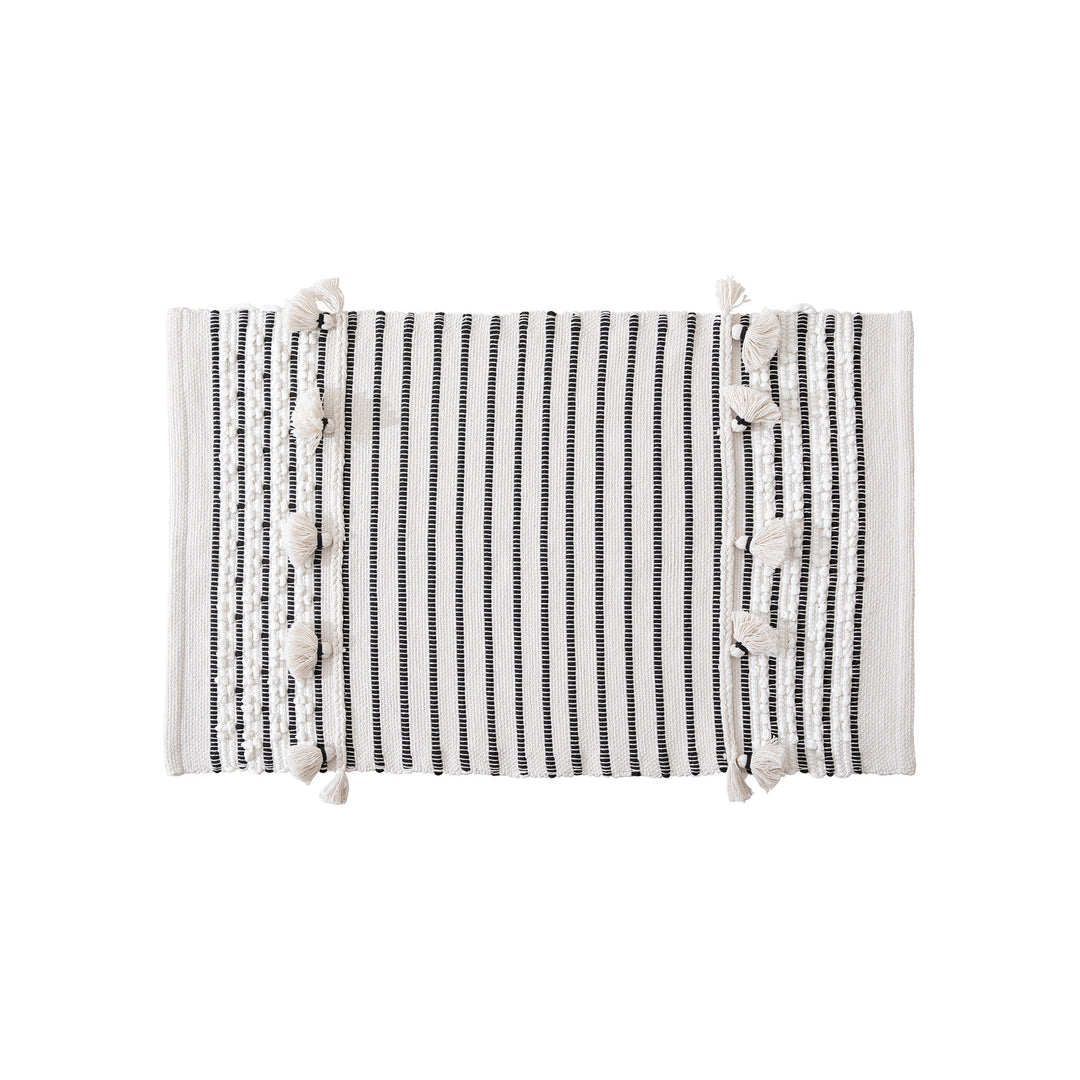 Handwoven runner with tassels and fine striped texture
