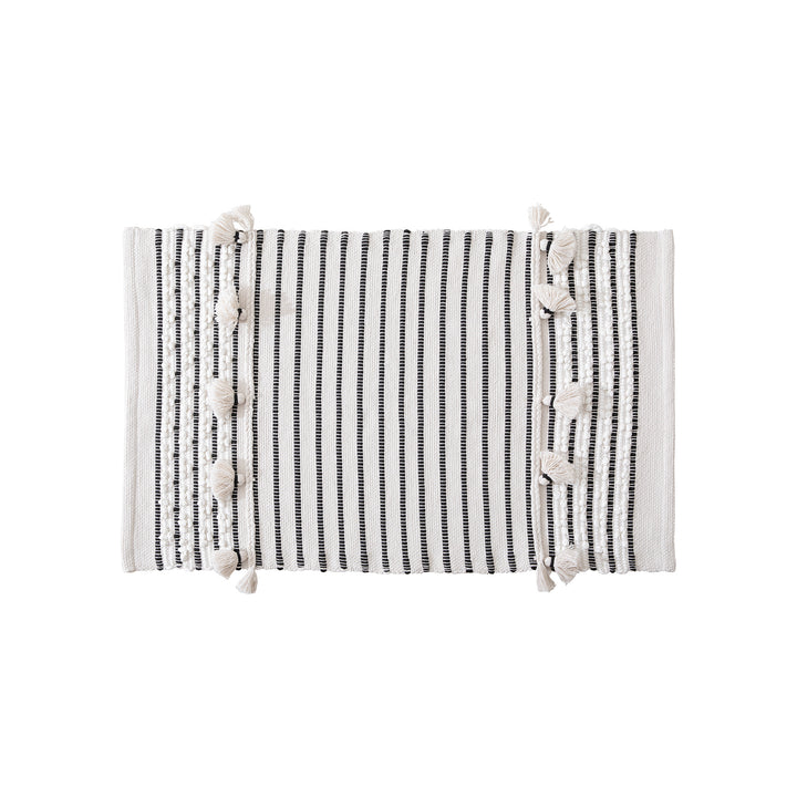Handwoven runner with tassels and fine striped texture