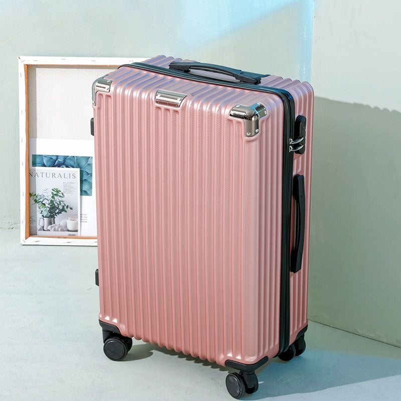 Hard shell suitcase with 360-degree wheel system and integrated safety feature Stornfield