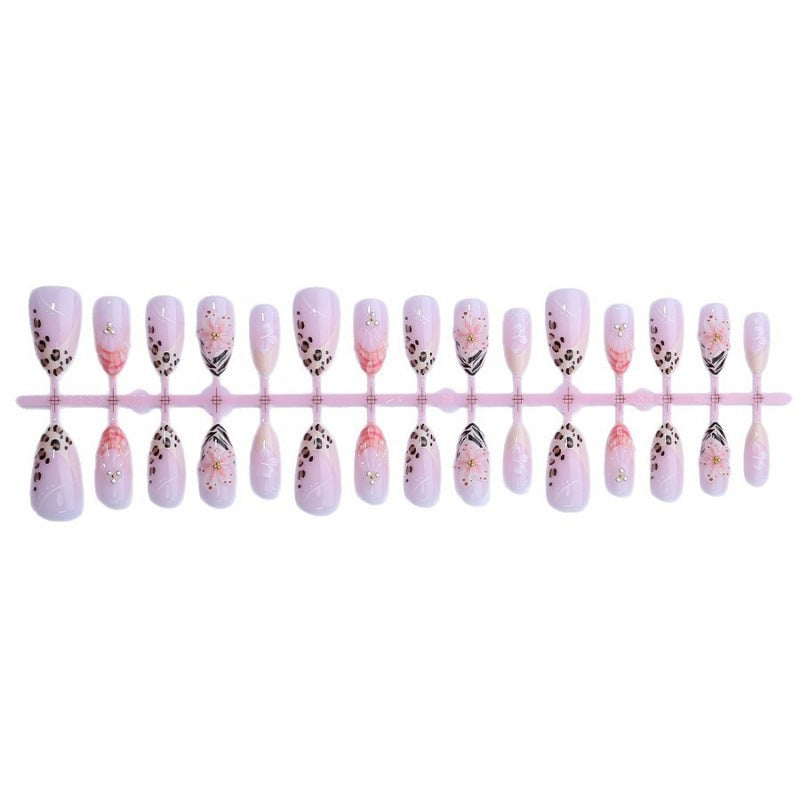 Artificial nail set with floral and leopard designs Stornfield