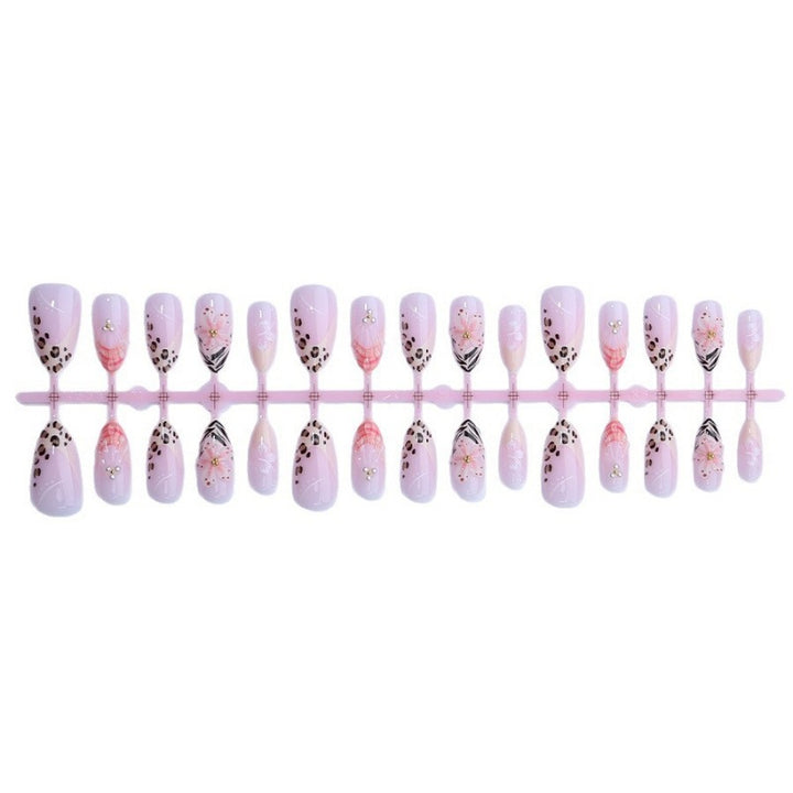 Artificial nail set with floral and leopard designs Stornfield