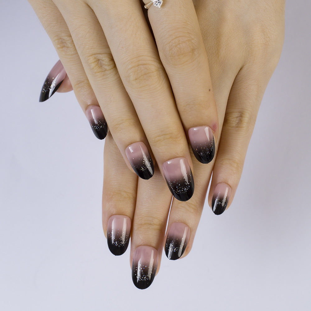 Artificial nails with elegant ombre design and sparkling accents Stornfield