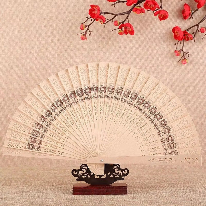 Ladies fine fan made of artistically pierced paper Stornfield