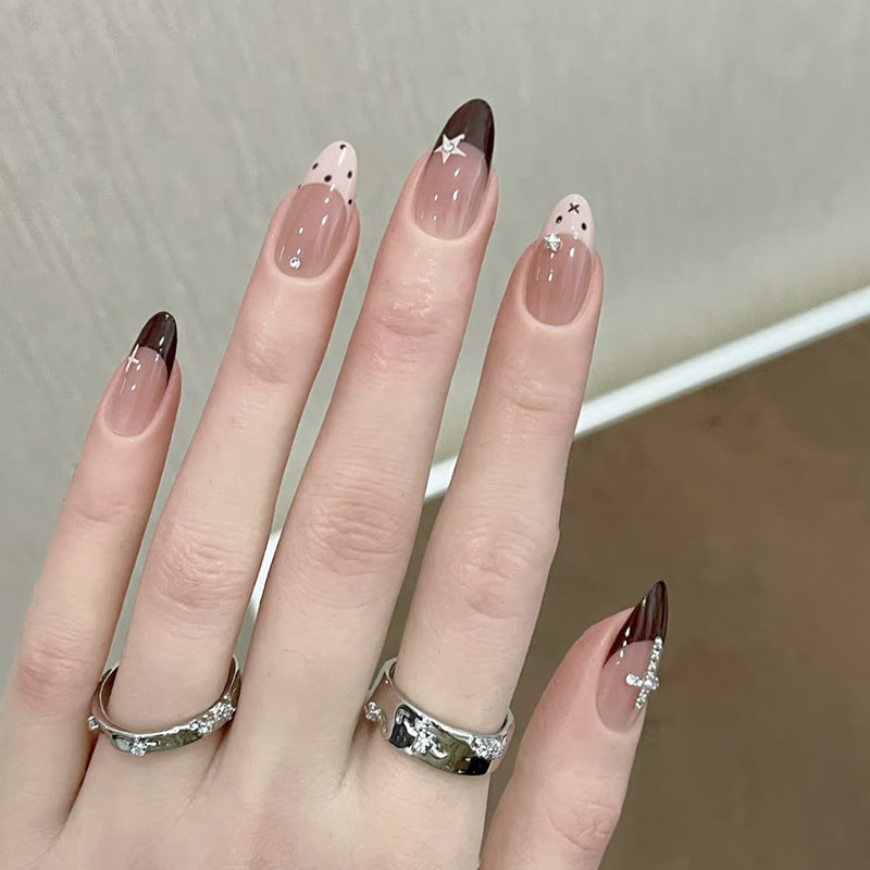 Glittering artificial nail design with elegant accents Stornfield