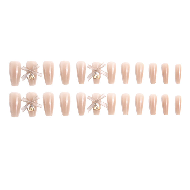 Artificial nail set with elegant 3D patterns and delicate accents Stornfield