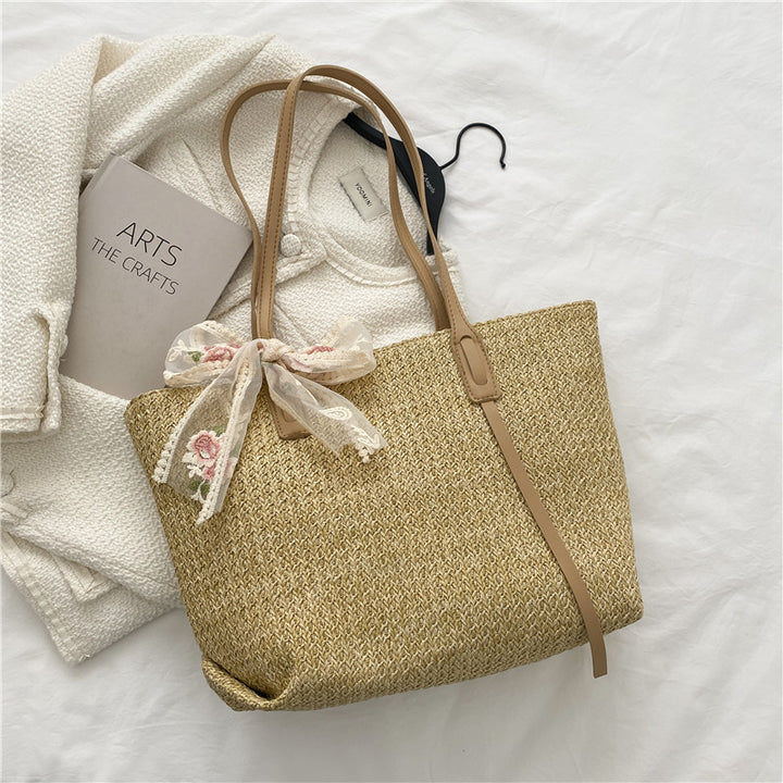 Elegant Woven Straw Tote Bag with Decorative Bow