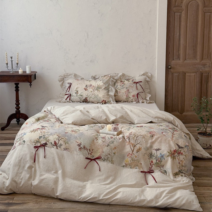 Bedding set with floral vintage linen look, ruffled pillow and bow tie