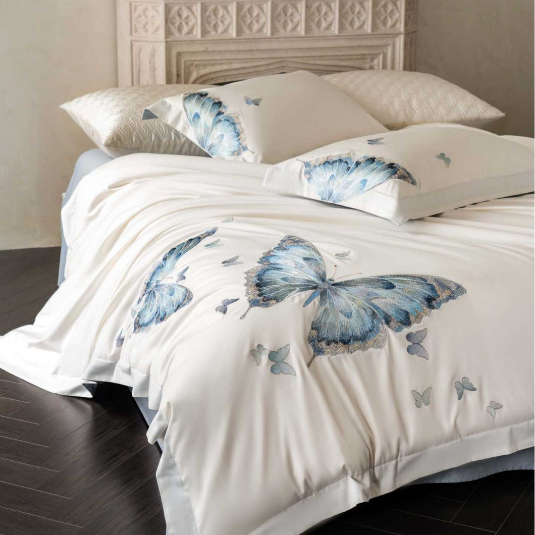 Embroidered cotton satin bedding set with blue butterfly motif