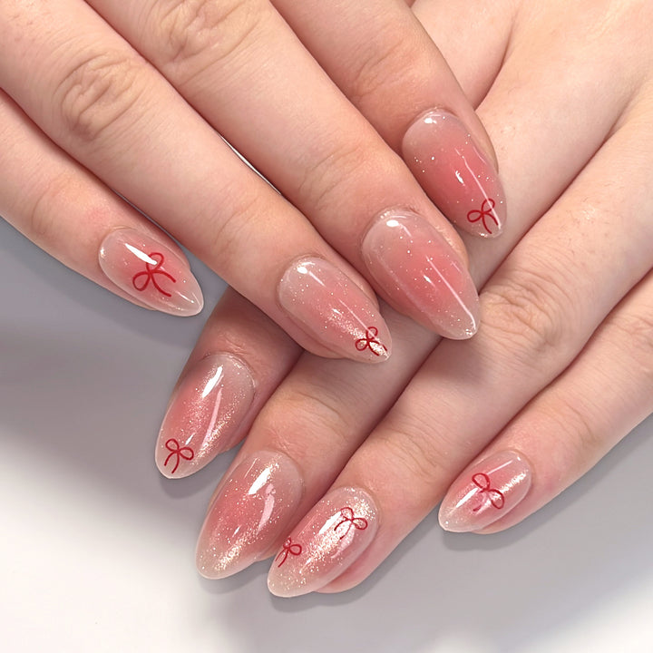 Artificial Nail Art with Bow Motif Stornfield