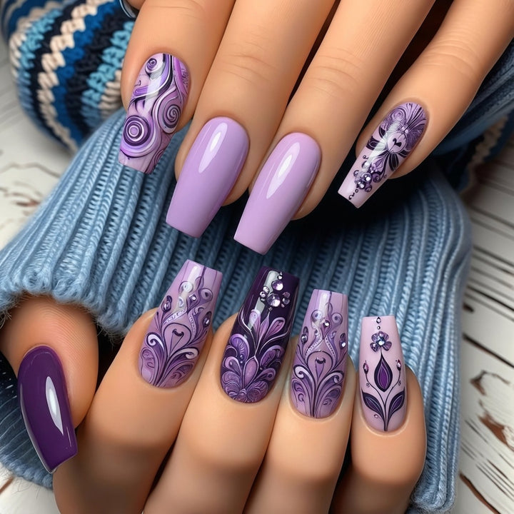 Artificial nails with intricate purple pattern Stornfield